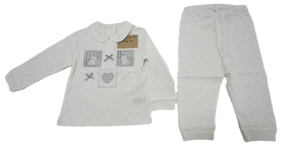 White bunny-patch pyjama top and dotted leggings