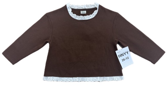 Brown long-sleeve top with white lace trim, front