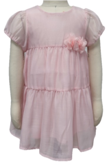 Pink tiered chiffon dress with flower corsage