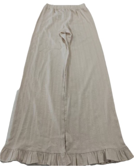 Beige ribbed wide-leg trousers with ruffle hems