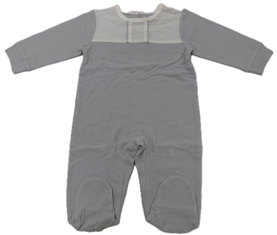 Grey footed sleepsuit with white yoke panel, flat-lay