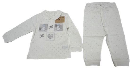 White bunny-patch pyjama top and dotted leggings
