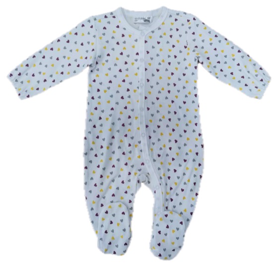 white footed sleepsuit with multicolour heart print