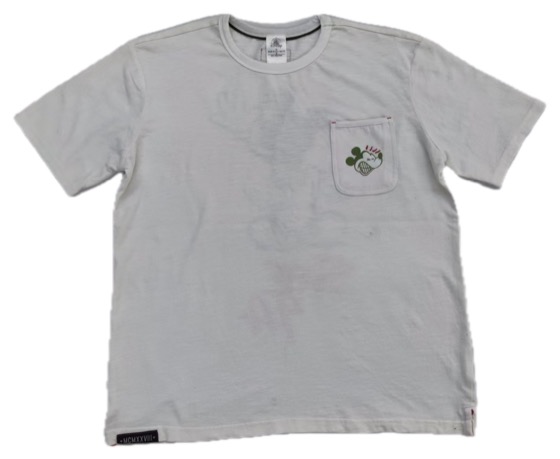 white pocket tee with small green Mickey embroidery